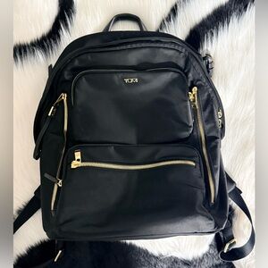 TUMI Montana Black Backpack with Gold Details